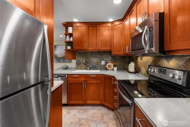 Updated kitchen opening to the dining area and breakfast nook, ideal for everyday living and entertaining