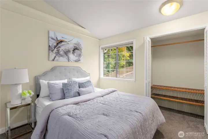 Second bedroom with natural light and ample closet space