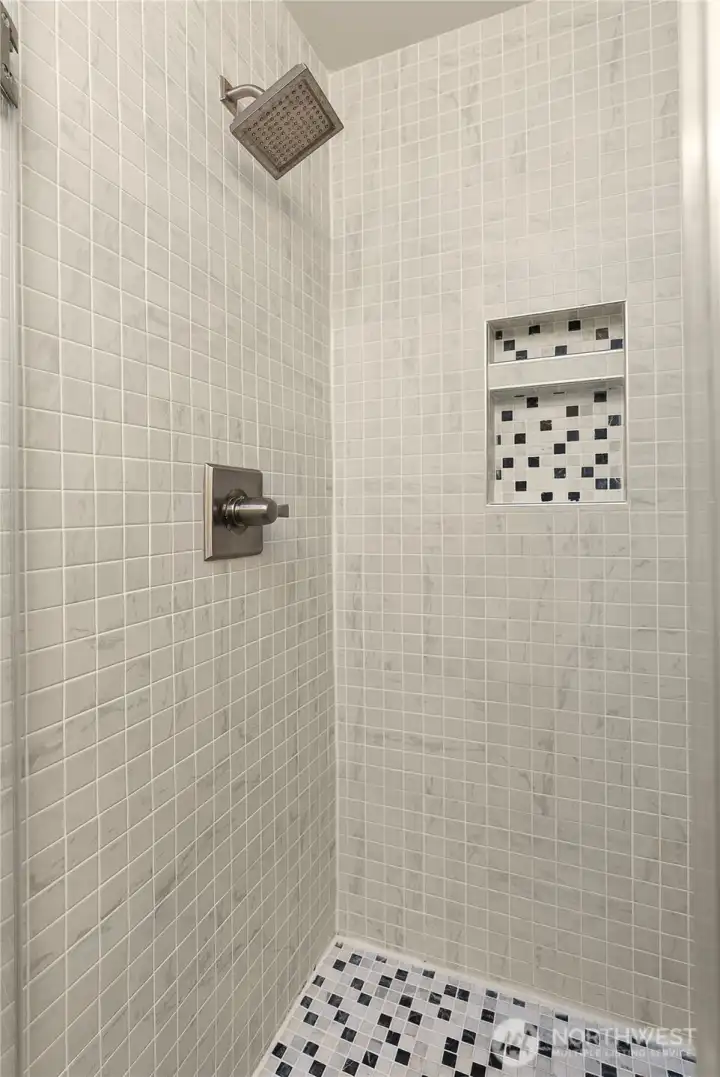 Primary ensuite bath with tiled shower