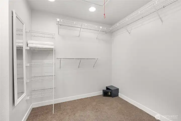 Spacious walk-in closet in the primary suite