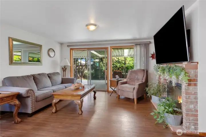 Family room with slider to covered deck, great for ntertaining
