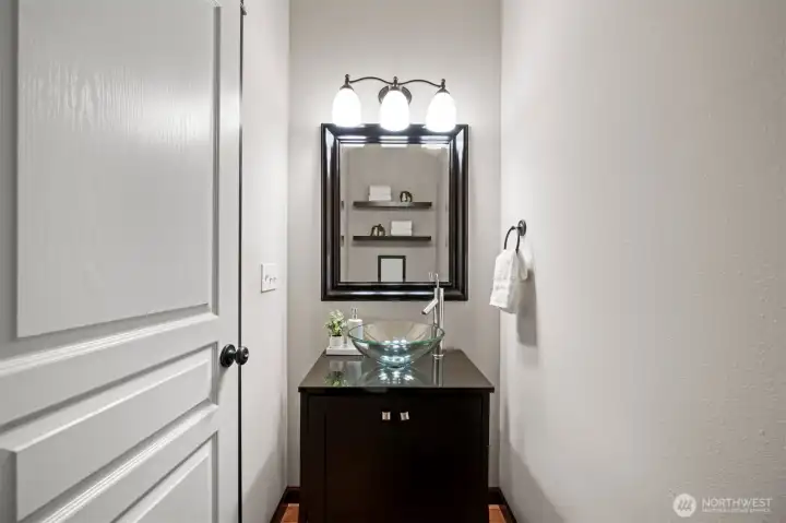 Creatively designed powder room on the main level.