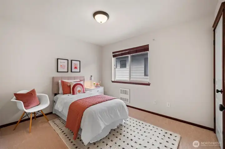 Third bedroom on the upper level. This home is located close to schools, amenities, parks, and more.