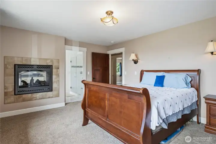 primary suite double sided fireplace