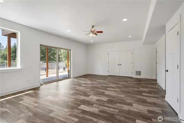 double doors lead to large storage area and safe room
