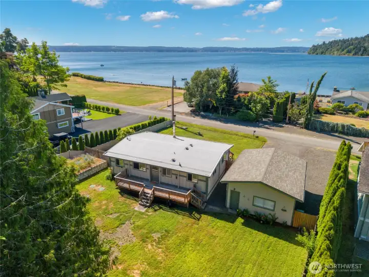 Across from community green area and beach access. Great water views Across from community green area and beach access. Great water views