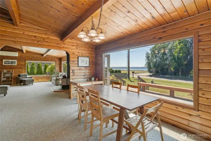 Dining area in kitchen with water view Dining area in kitchen with water view