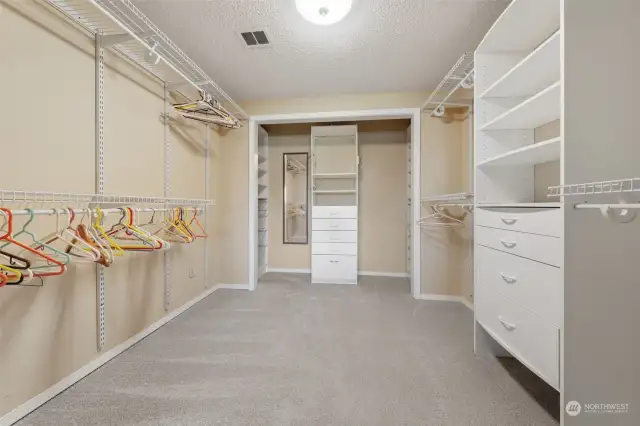 Embrace the openness of this amazing Walkin closet.