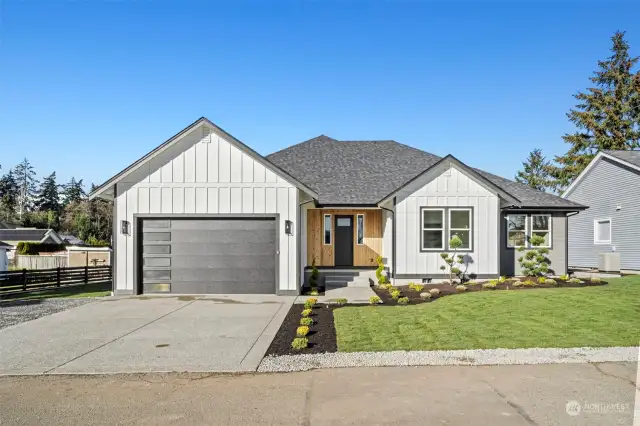 Beautiful NEW construction home with a 2 car garage and room for side parking for RV/trailer etc.