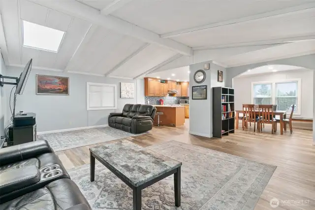 Vaulted ceilings with an open floor plan and plenty of natural light.