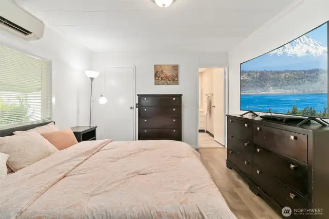 Spacious primary bedroom with updated bathroom.
