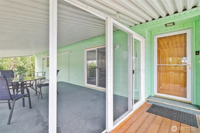 Front door that leads inside or use the slider to fantastic covered deck.