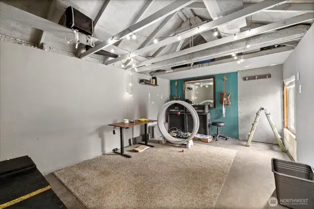 More space in detached garage.  Used as living space currently, but could be garage, or storage space.