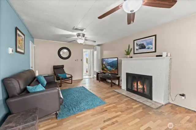 Inviting fireplace for those cozy nights, and hardwood floors.