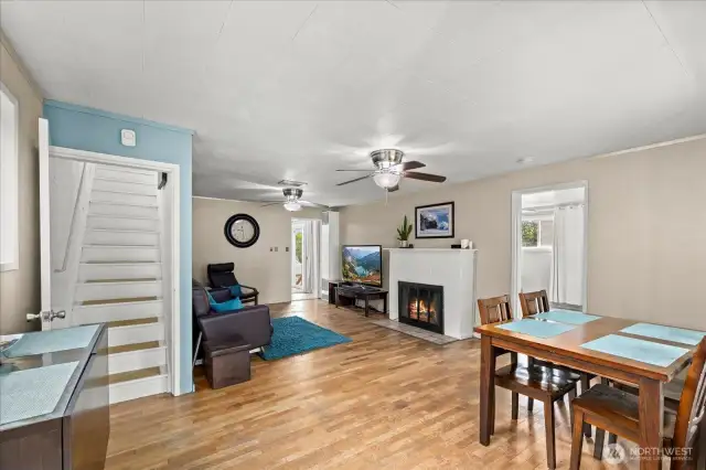 Stairs to the left lead to 2 bedrooms upstairs