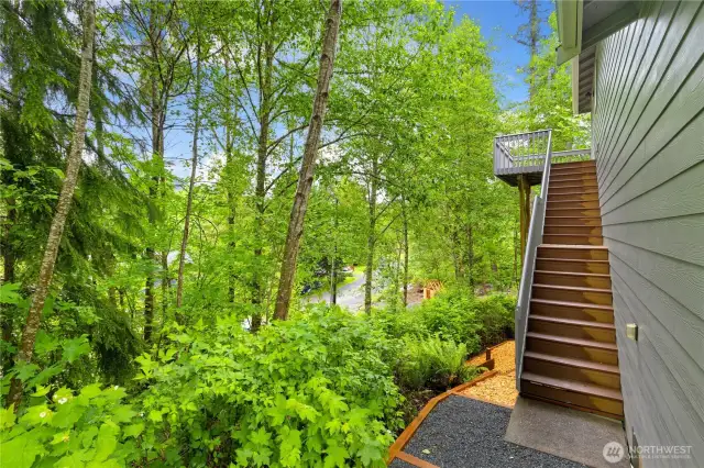 Stairs from upper level to back yard