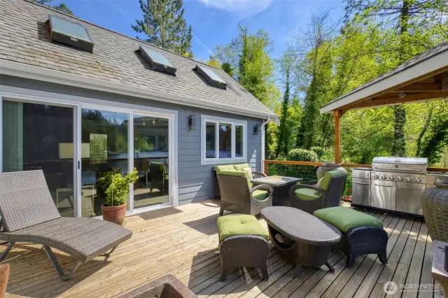 Spacious deck and entertainment area overlooking the lake