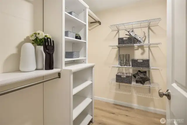 Walk-in closet with closet system on both sides