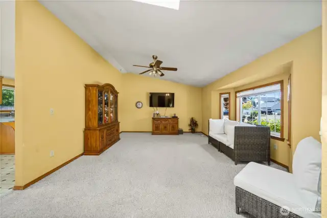 Here's another view of the living room with the vaulted ceiling and skylights.