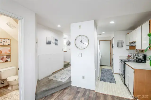 Enter in from your garage to your kitchen with pantry space.