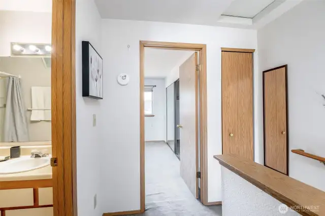 Linen closet at the top of the stairs.
