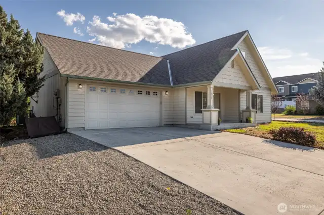 Two car garage, driveway parking, and street parking