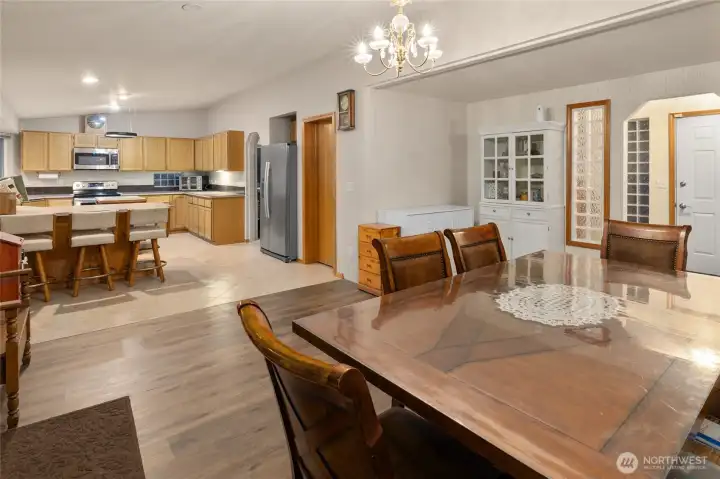 Open kitchen connected to laundry/mud room a