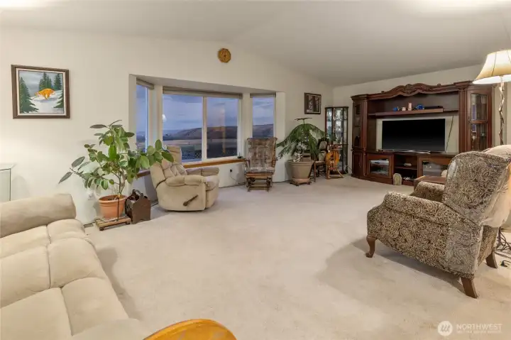 Family living room with lots of light and beautiful views
