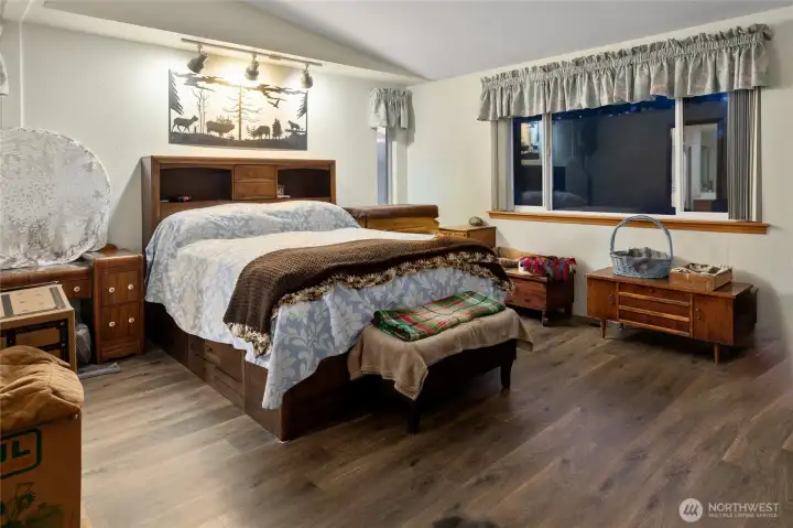 Primary bedroom with large en-suite bathroom