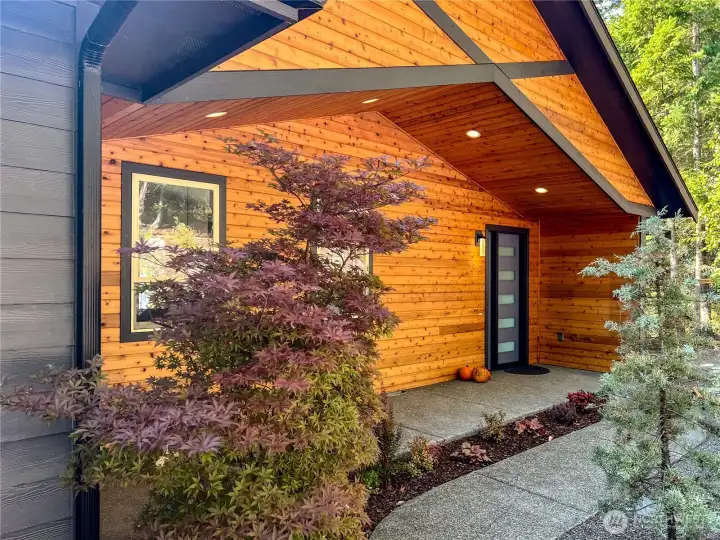 Radiant wood accented front exterior!