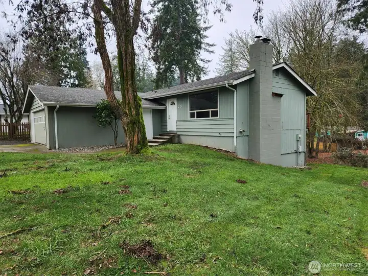 Nice yard with a gradual sloping down to the back yard.