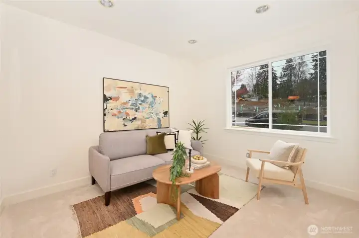 This is the living room for the ADU and it has a door that is flexible to connect to the main house.