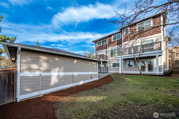 This oversized lot is 8,250 square feet and goes from 30th to the alley.