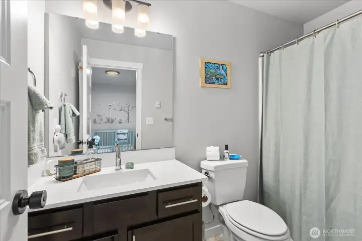 Private bath attached to second bedroom.