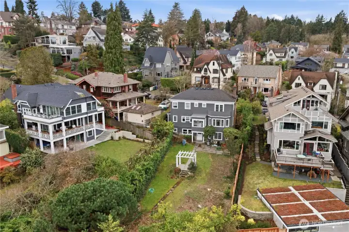 Huge back yard/garden area leading to alley below.  (essentially flat lot)