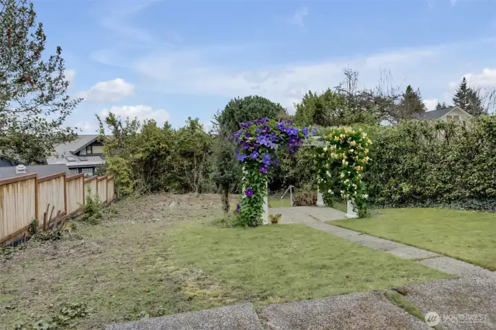 Back yard with gazebo.  2-car garage below on alley.