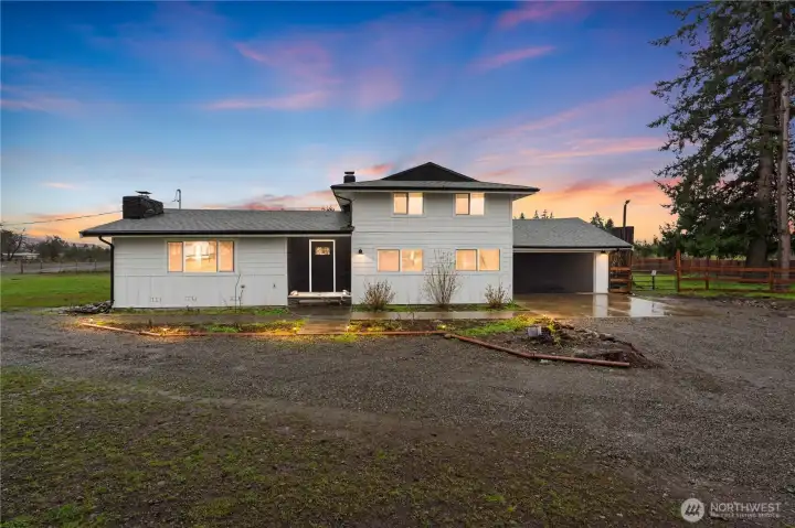Welcome home! This modern farmhouse on just over 4 acres with a detached shop.