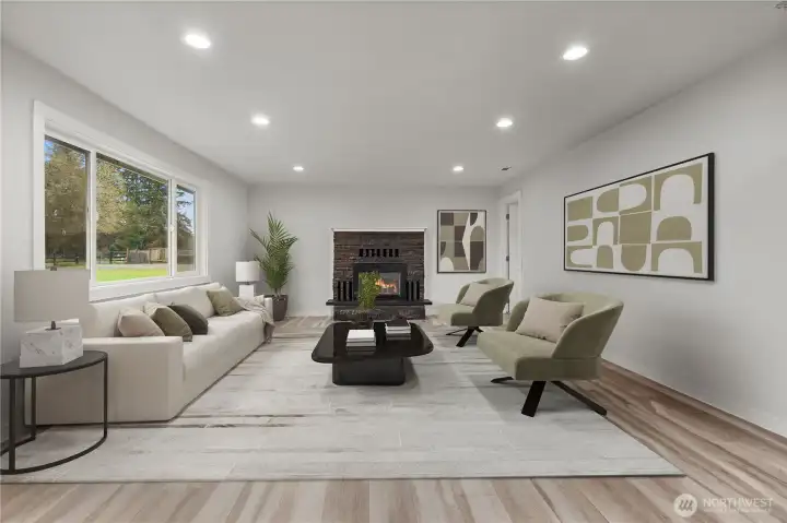 Step inside to a wood burning fireplace and cozy light-filled living space!