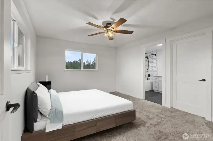 Relax in the main-floor primary bedroom with its own en-suite and generous walk-in closet.