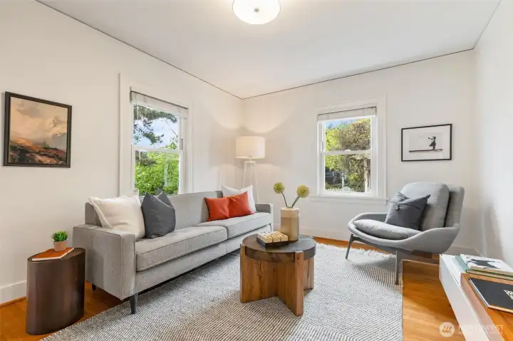 Versatile main floor room with westerly light and a large closet—ideal as a den, bedroom, or office