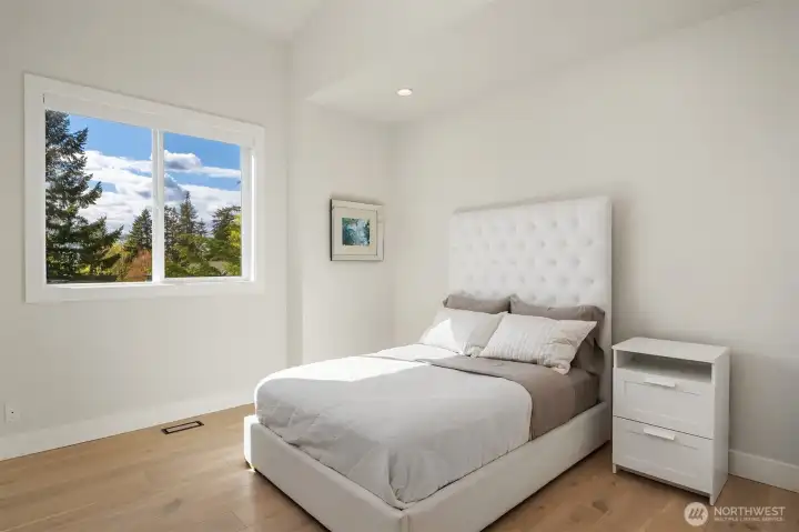 Bedroom on upper level with territorial view Bedroom on upper level with territorial view