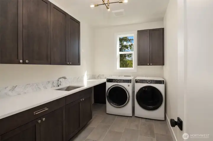 Laundry Room on upper level, Basement is plumbed & ready for additional laundry set.
