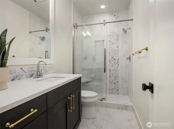 Basement en-suite Bathroom with heated floor. Basement en-suite Bathroom with heated floor.