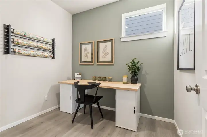 Versatile home office or den. Photos are representative only and may display different color package and/or upgrades.