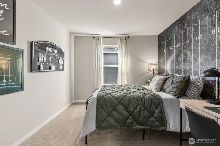 Comfortable secondary bedroom.  Photos are representative only and may display different color package and/or upgrades.