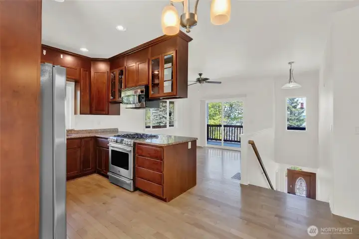 Looking towards living room with sliding doors to wrap around deck