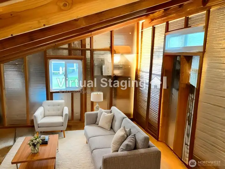 Upstair studio in workshop - accessed by ladder stairs. Staged w/AI