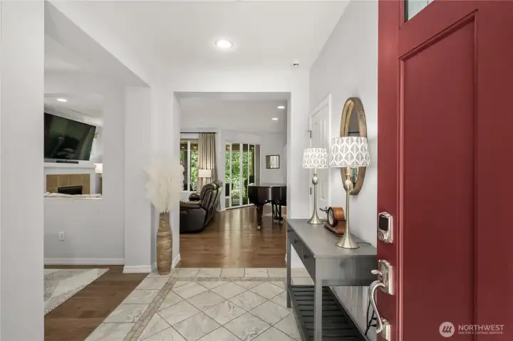 Custom tiled entry welcomes you into the home.
