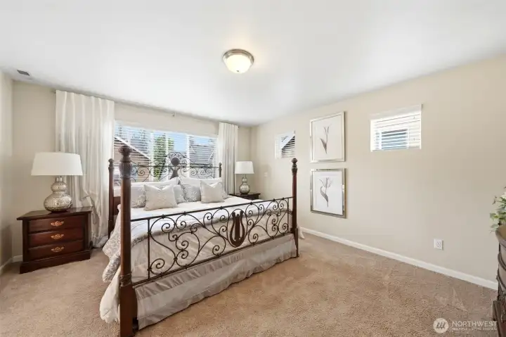 Primary bedroom with abundant natural light. Primary bedroom with abundant natural light.