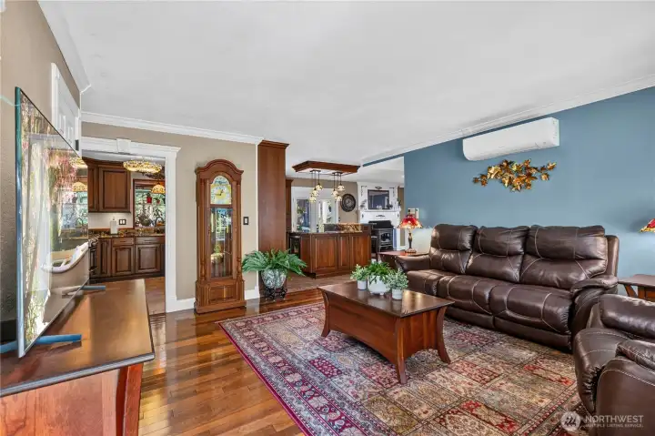 “View from the front door looking toward the kitchen.” “View from the front door looking toward the kitchen.”